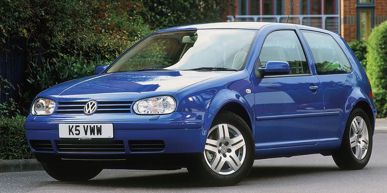Blue VW Golf on the road