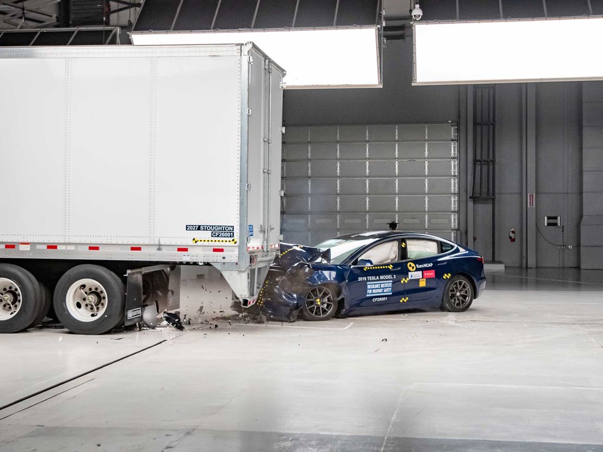 The aftermath of a car crashed into the back of a trailer fitted with the US voluntary Toughguard standard. The car's passenger compartment hasn't been compromised.