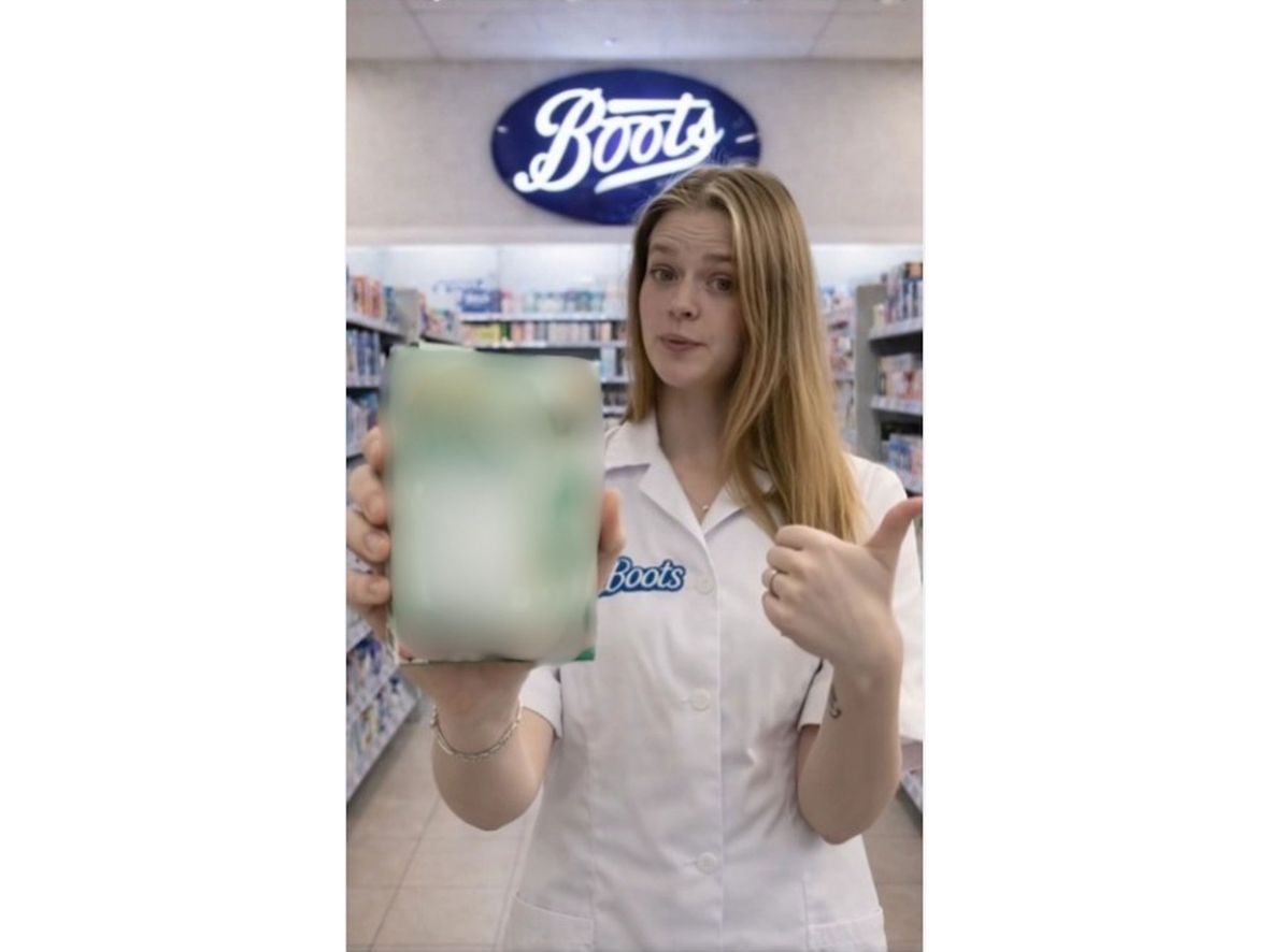 The woman’s hand is visibly distorted and the Boots logo on her uniform goes through very subtle changes throughout the video