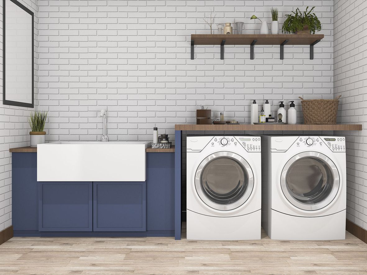 Adding a worktop above your appliances makes the most of the space you have, while the large, low sink is great for washing by hand.