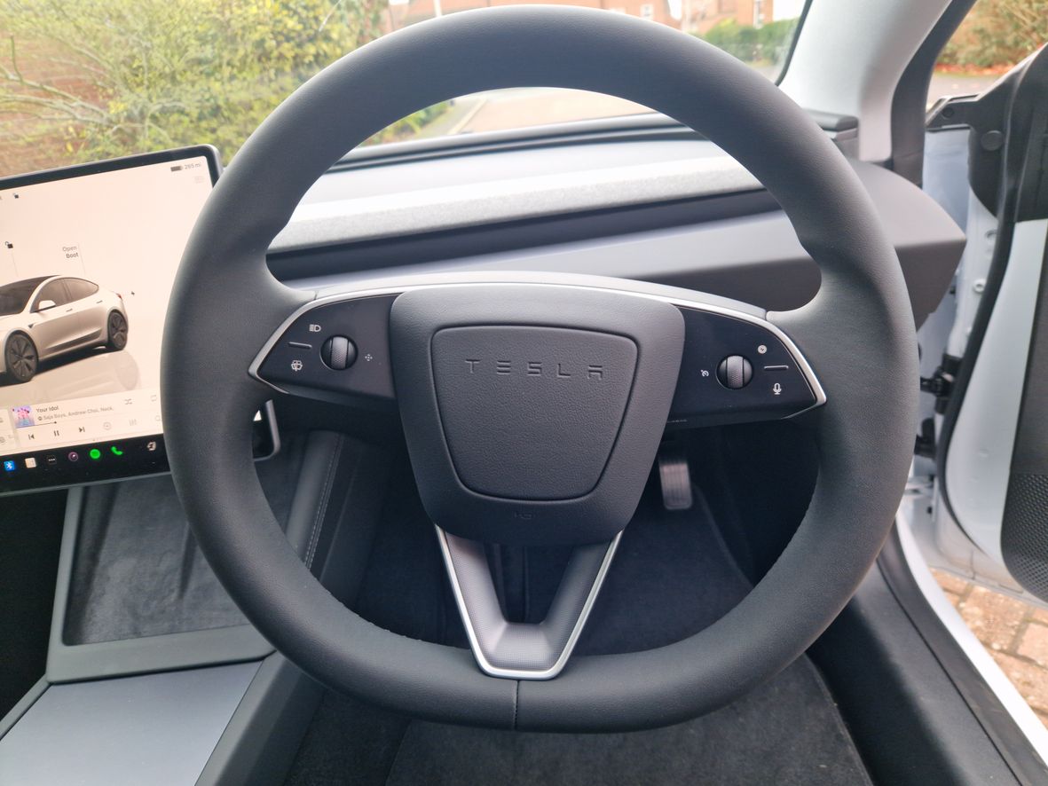 The 2026 Model 3 sees the return of the indicator stalk, with the steering wheel buttons reassigned to other functions