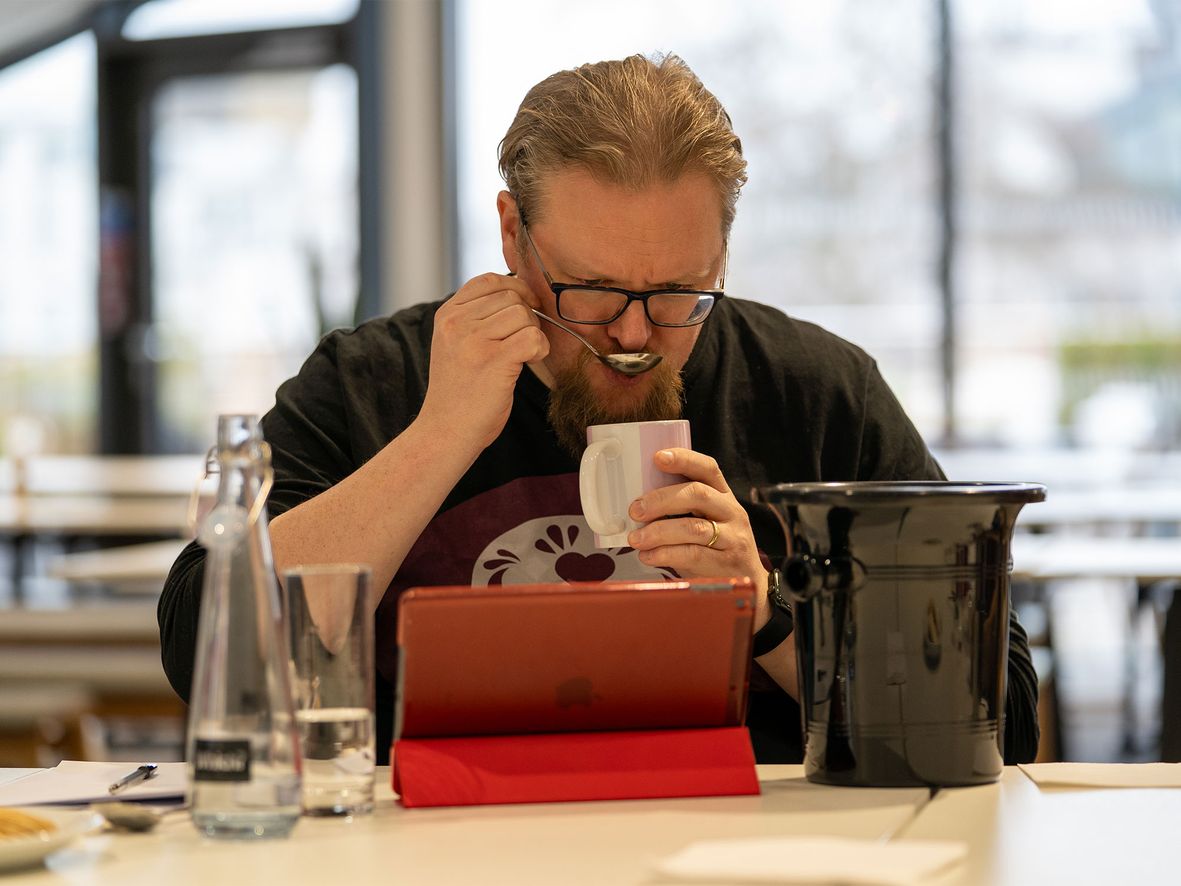 David Jameson tasting coffee in our taste test