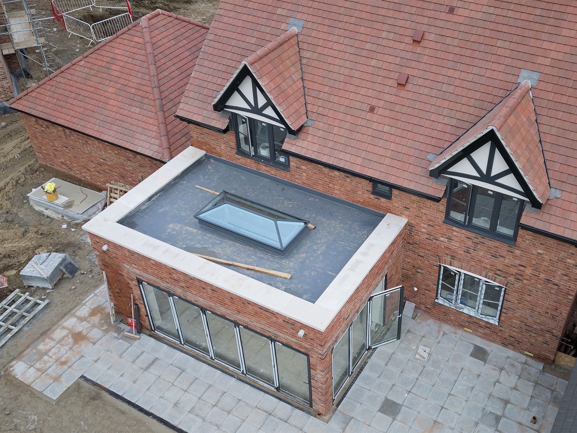 orangery extension with lantern roof on a detached house