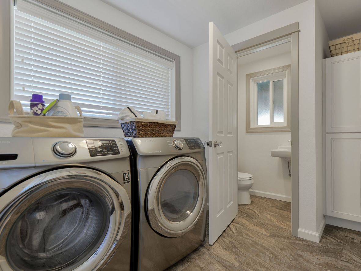 You will already have water running to a downstairs bathroom. Placing your utility room next to or within that area will save money and time on plumbing.