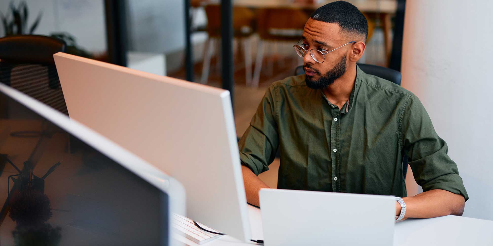 A person working on a computer monitor