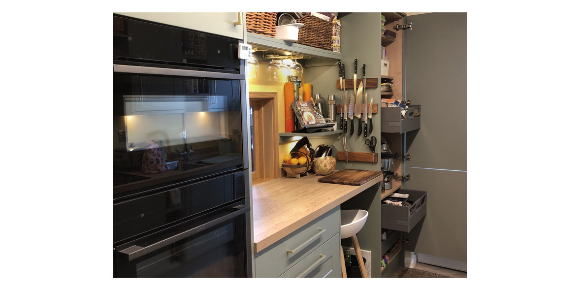 Green Howdens kitchen in a real home