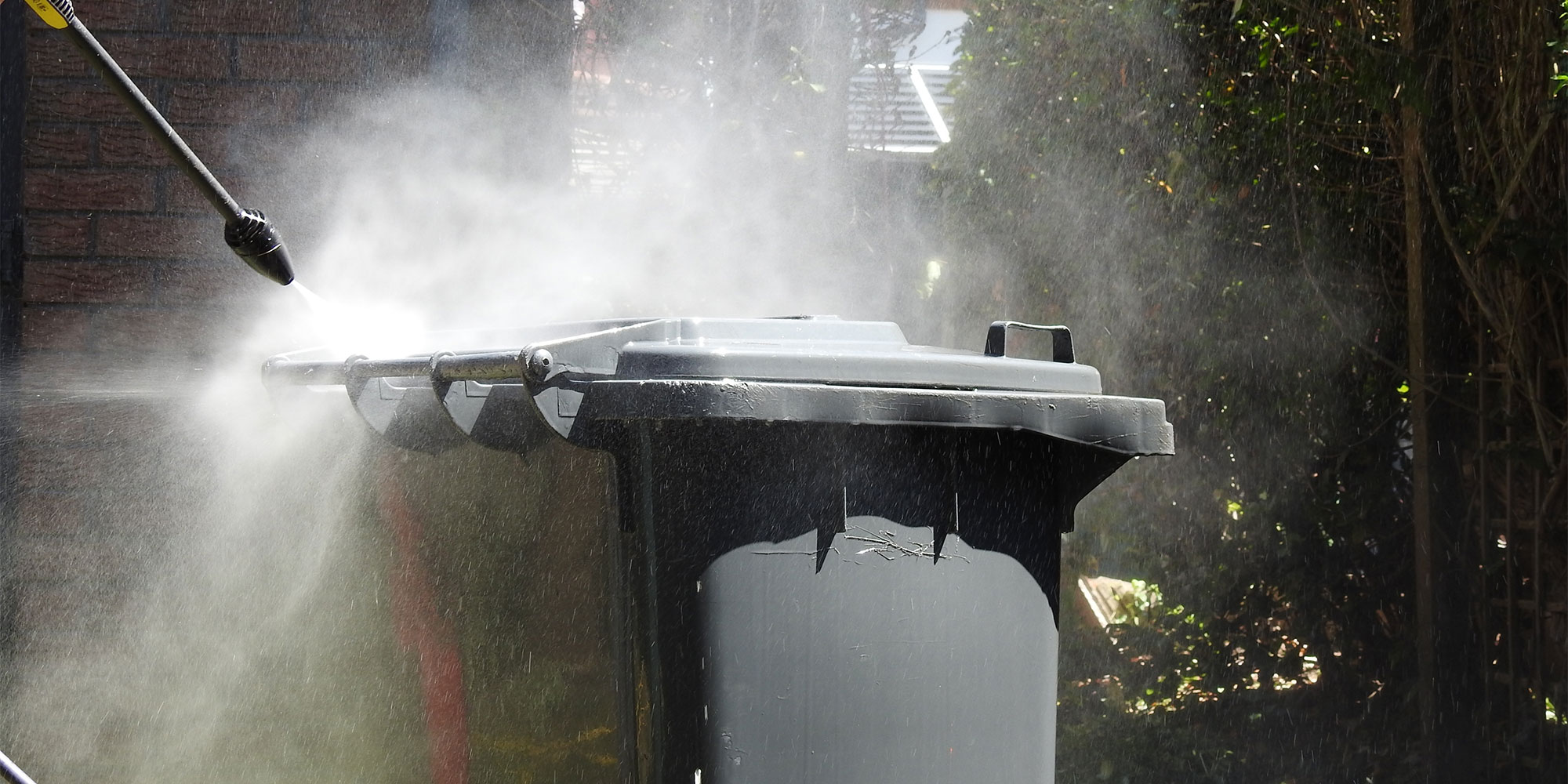 Cleaning a wheelie bin