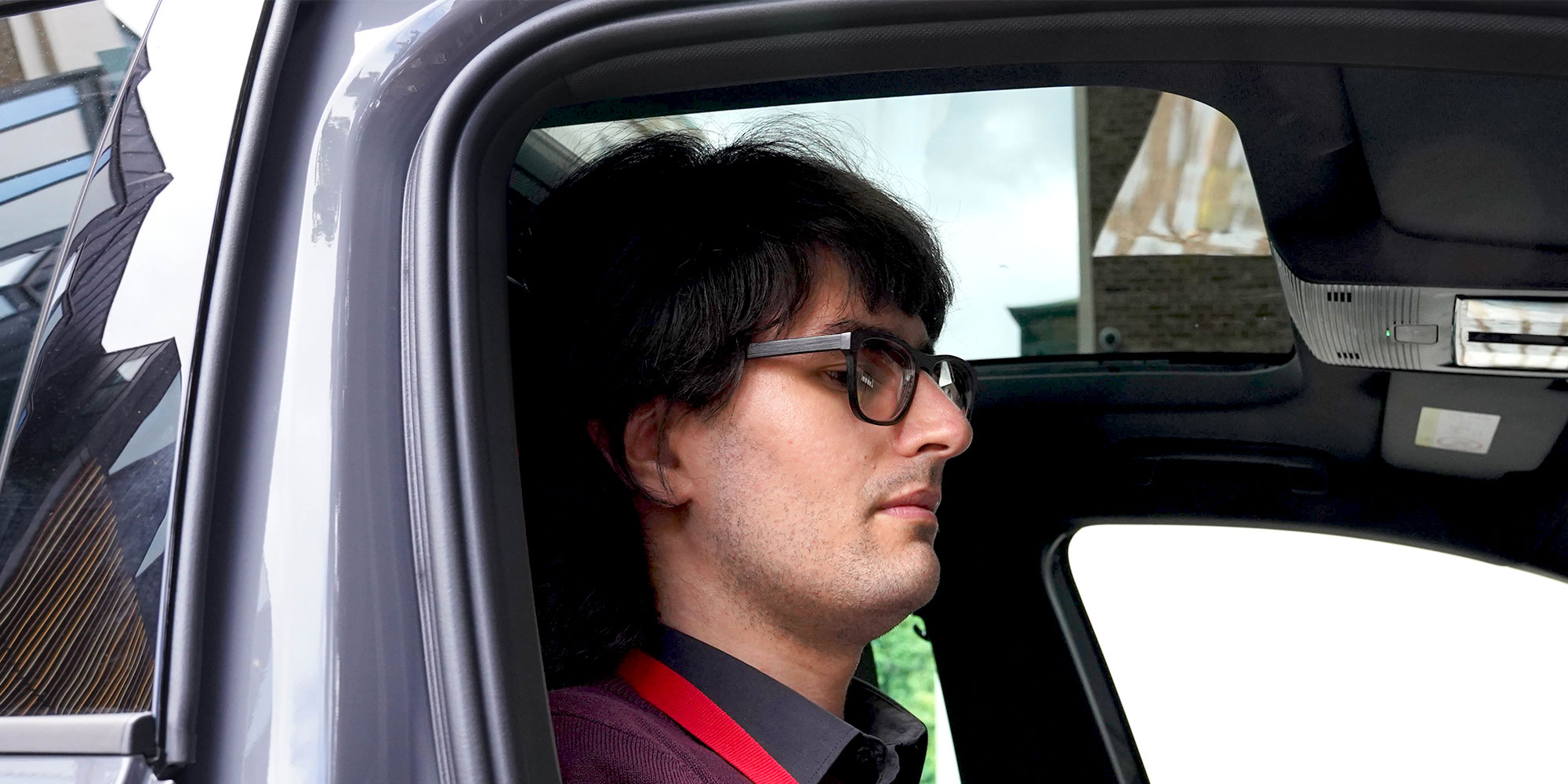 Dino Buratti sits in a Seat Leon