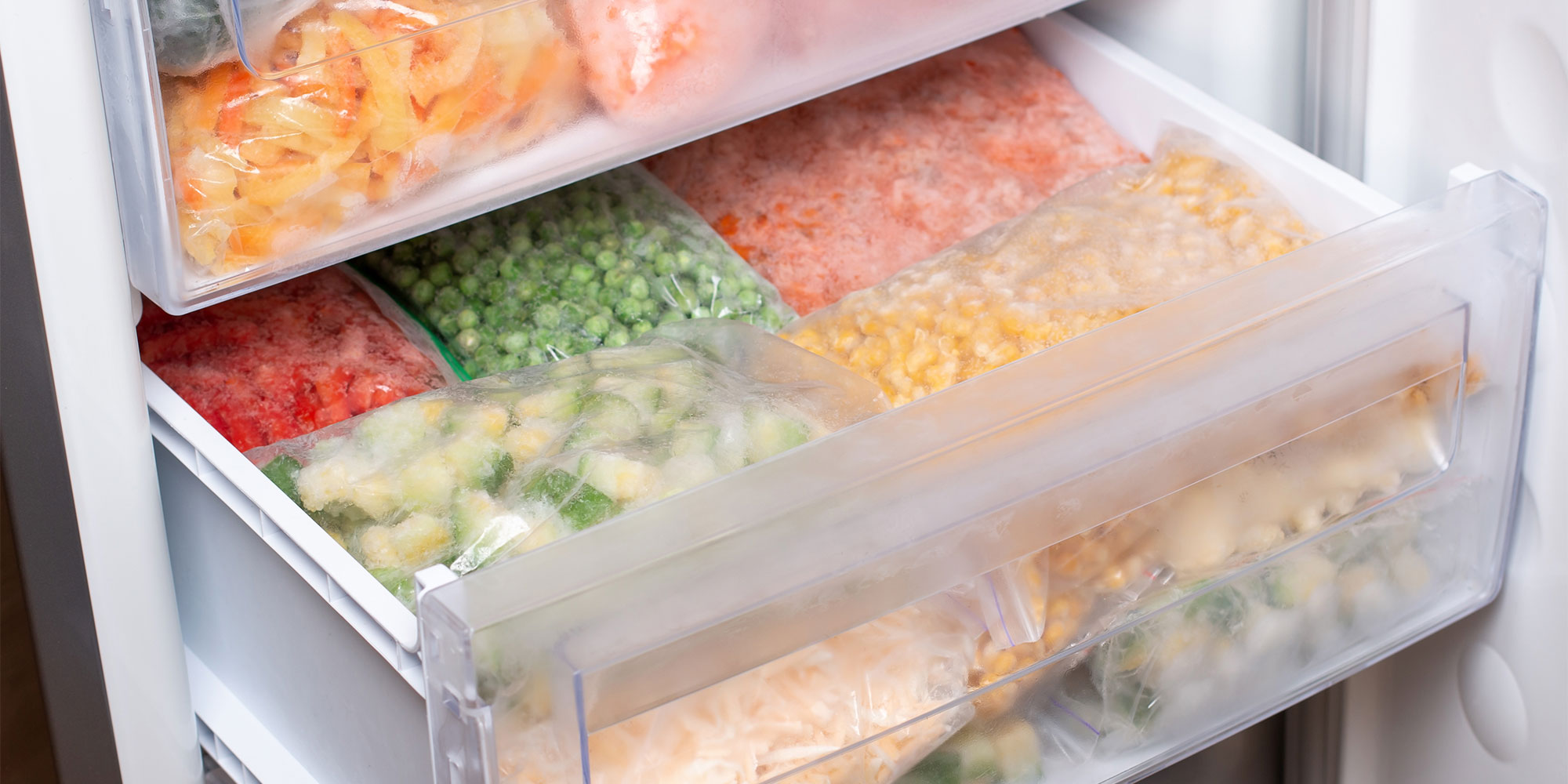frozen vegetables in freezer drawer