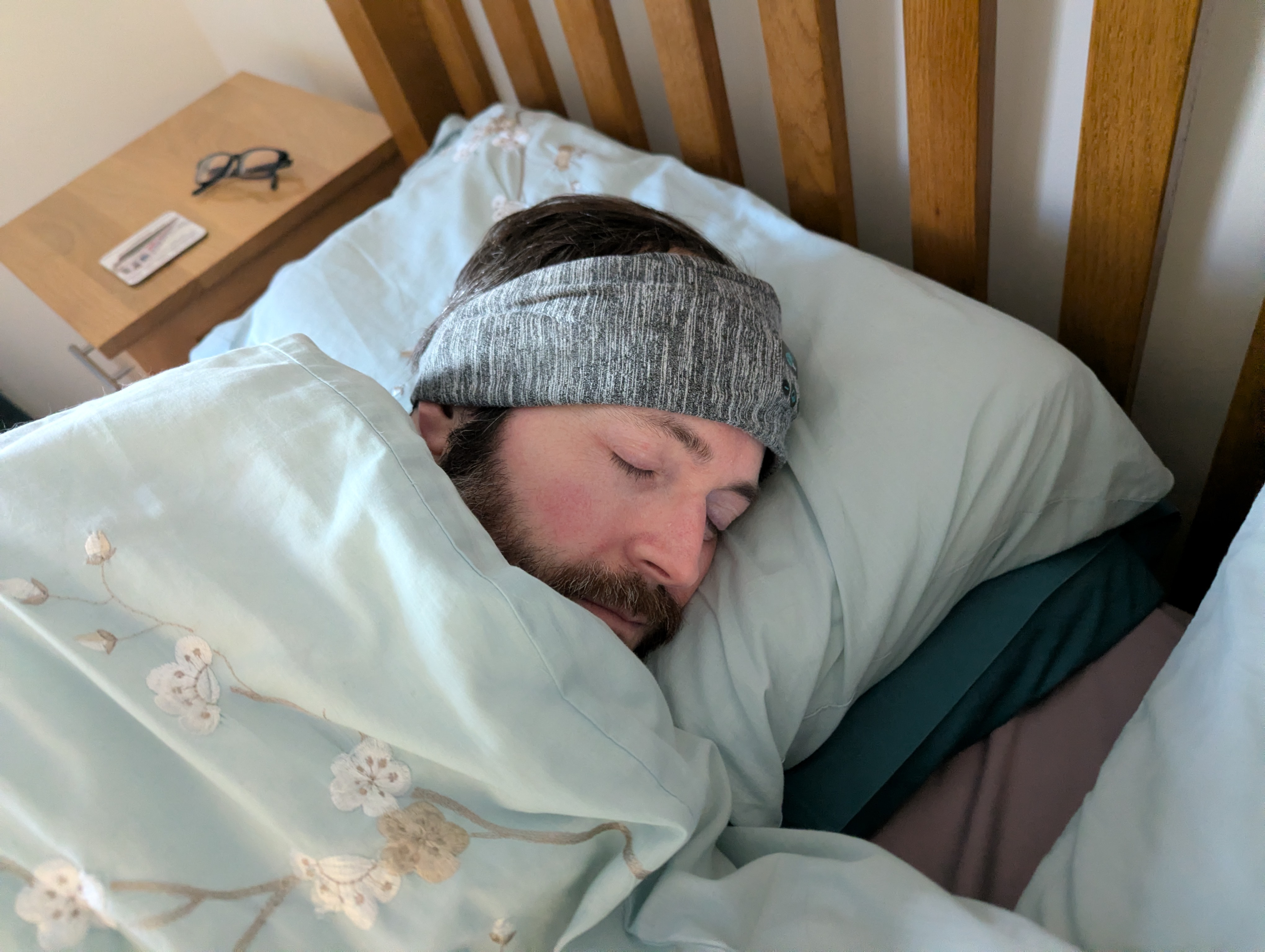 author sleeping in sleep headphones. 