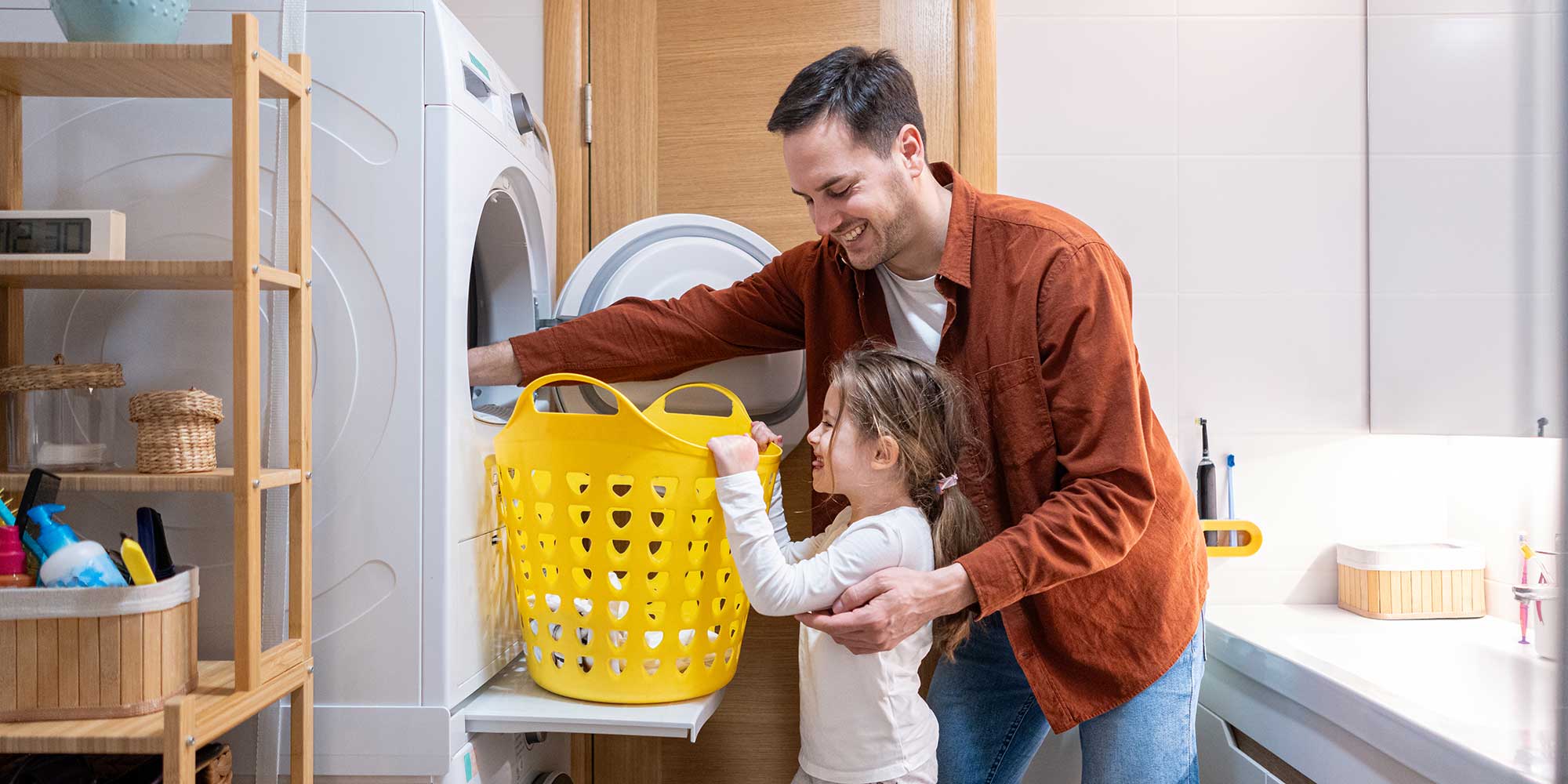 Man removing clothes from washing machine