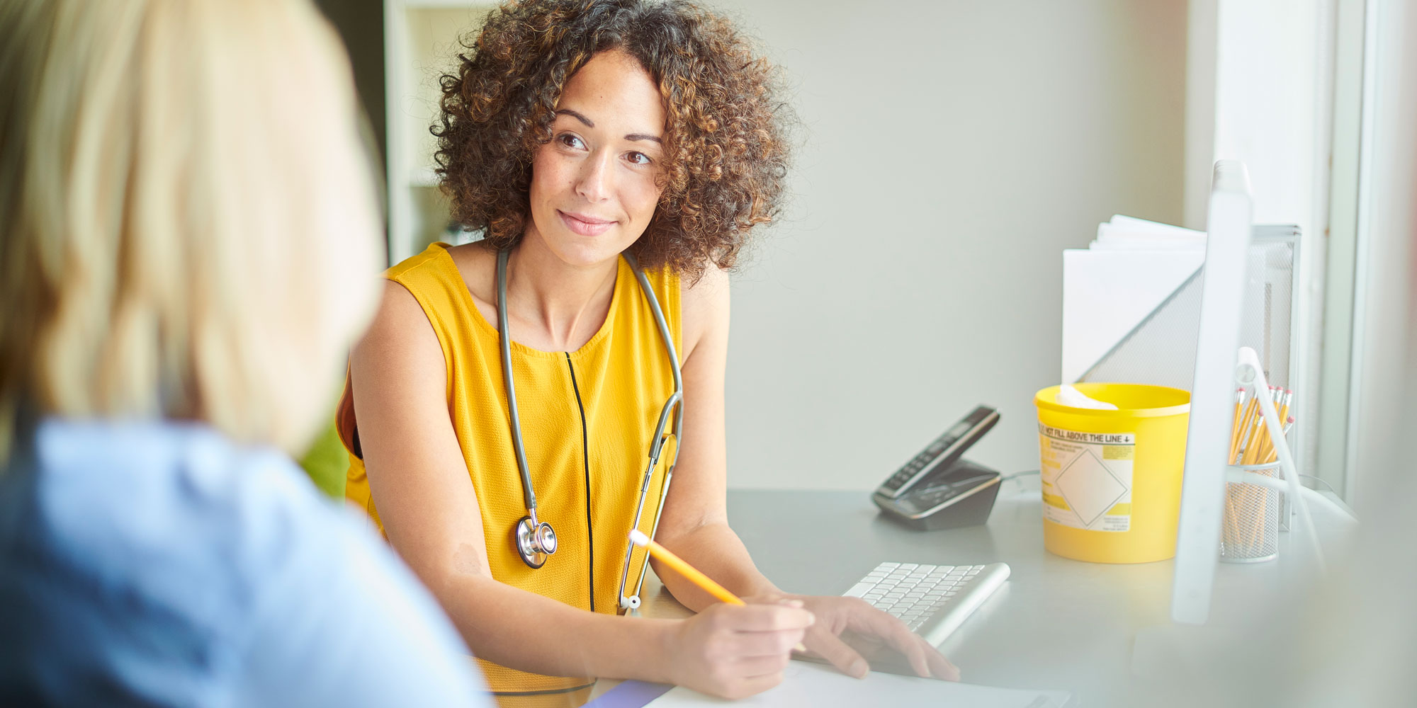 woman having GP appointment