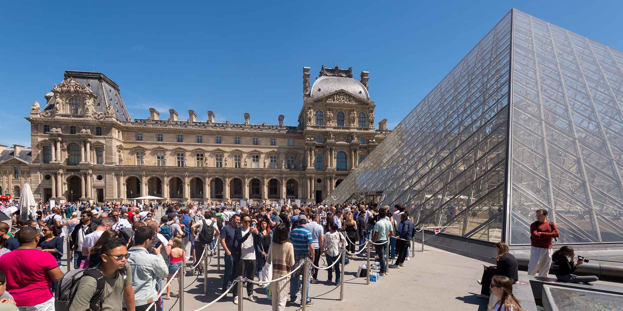 People queueing at the Louvre
