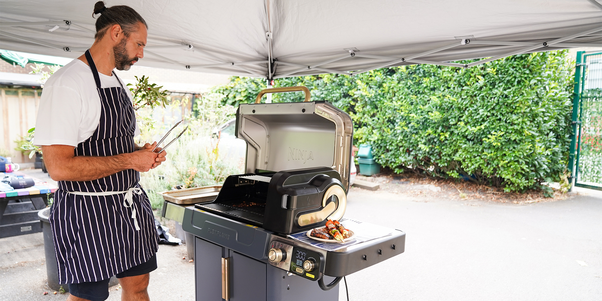 Chef James Adams cooking on a BBQ