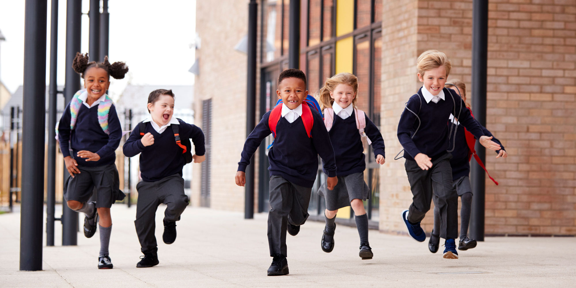 happy children in school uniform