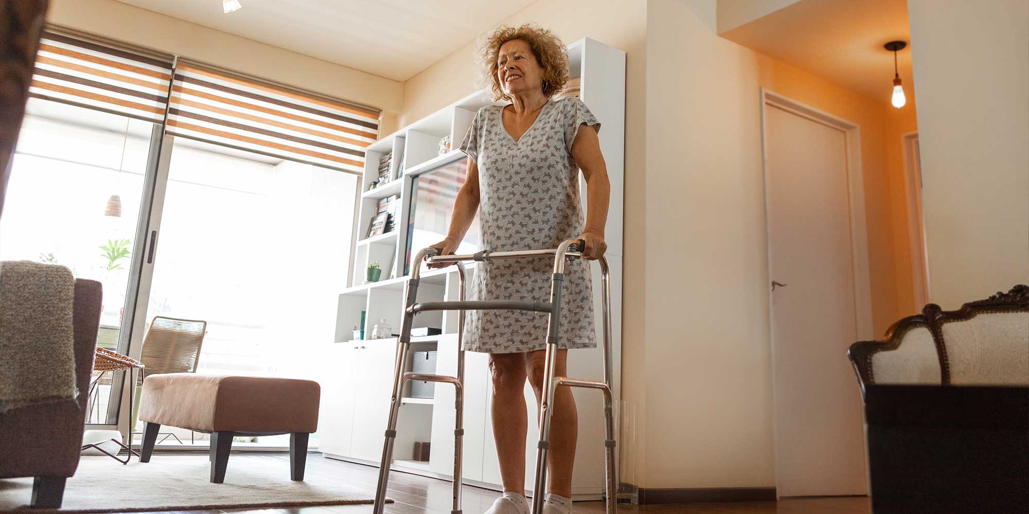 Woman using walking frame