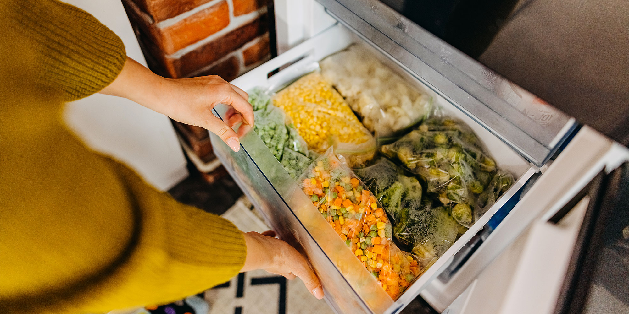 Freezer drawer stocked with vegetables