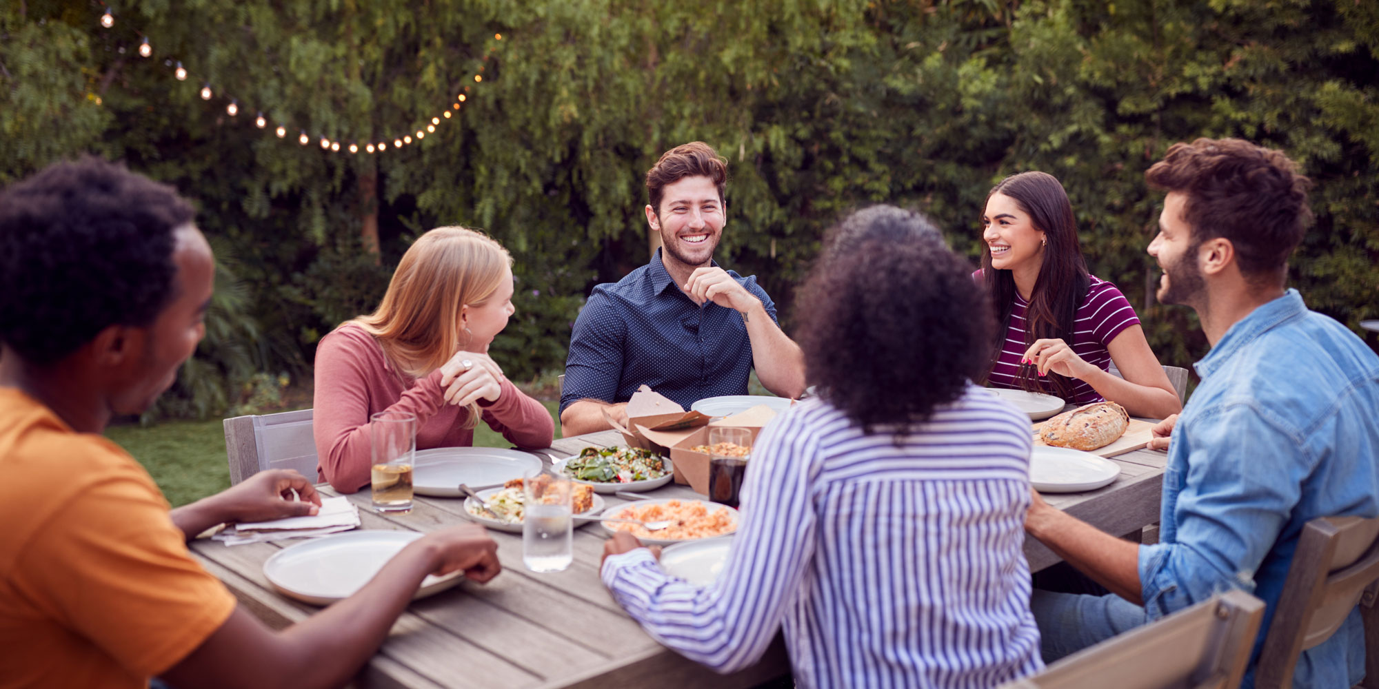 People eating at an outdoor table