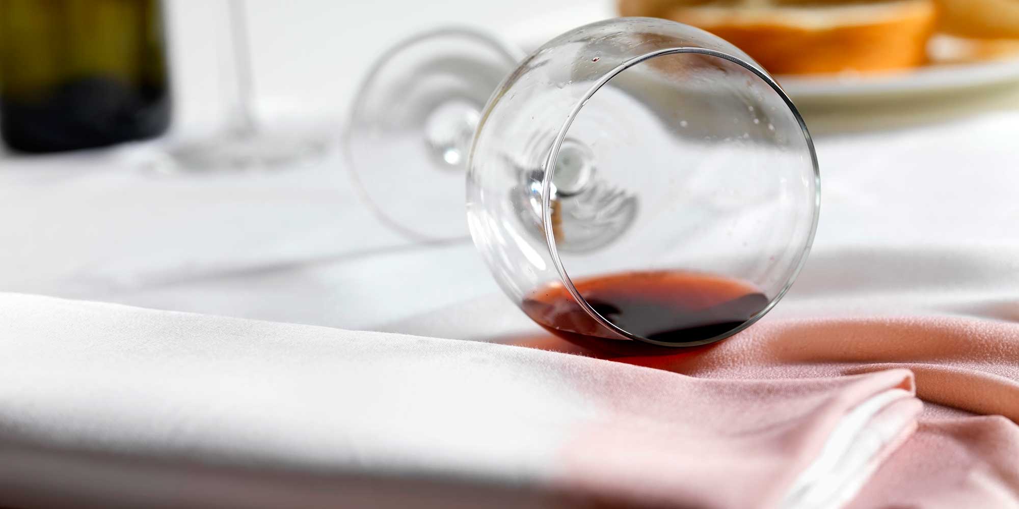 Knocked over glass of red wine