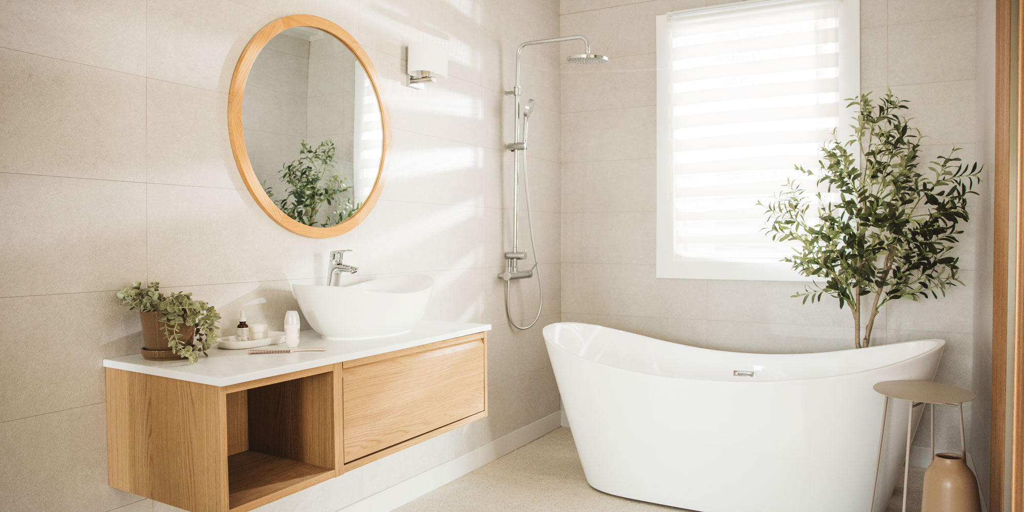 a bathroom with large format tiles
