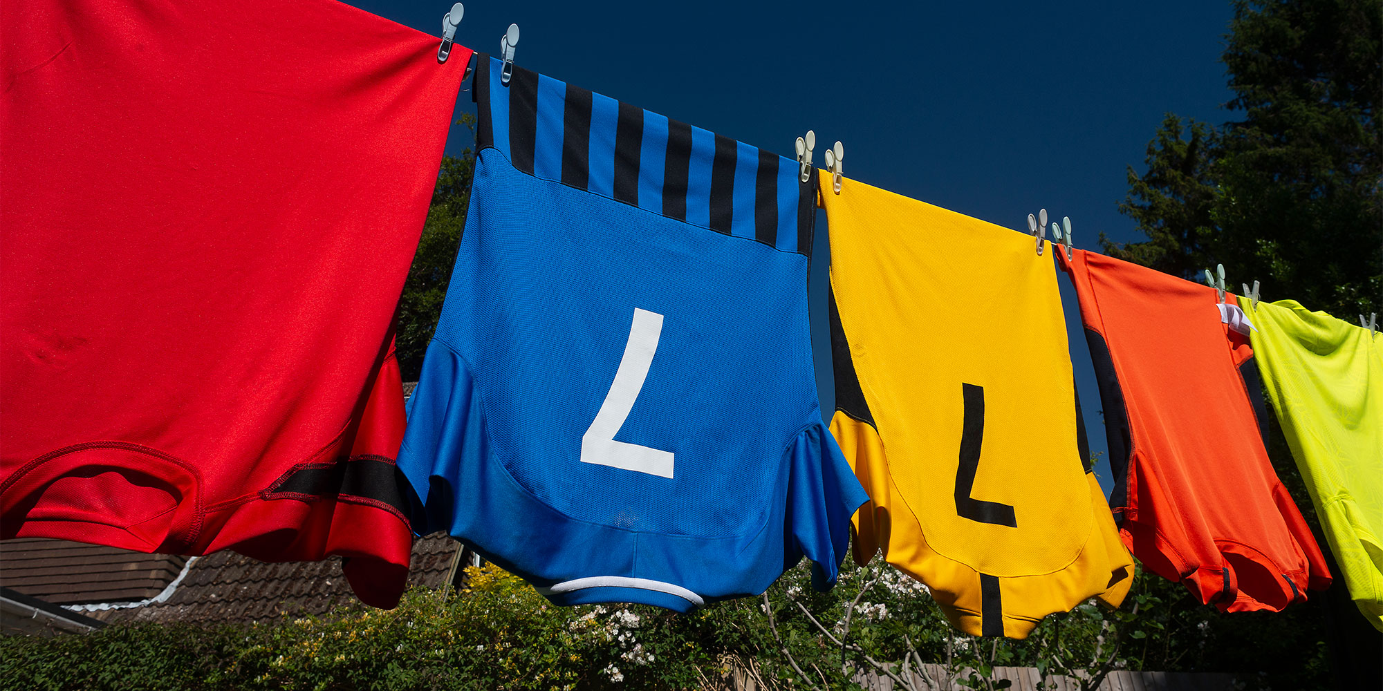 Football shirts on a washing line