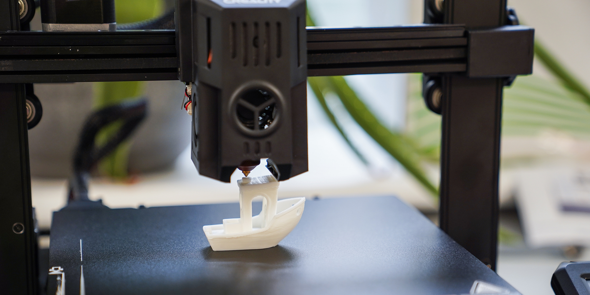 A 3DBenchy test model being printed