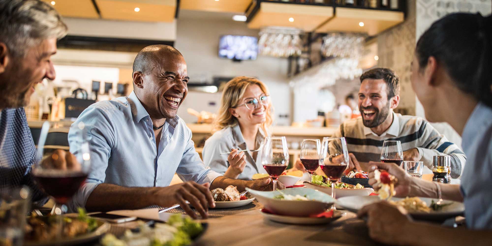 Group of people eating meal