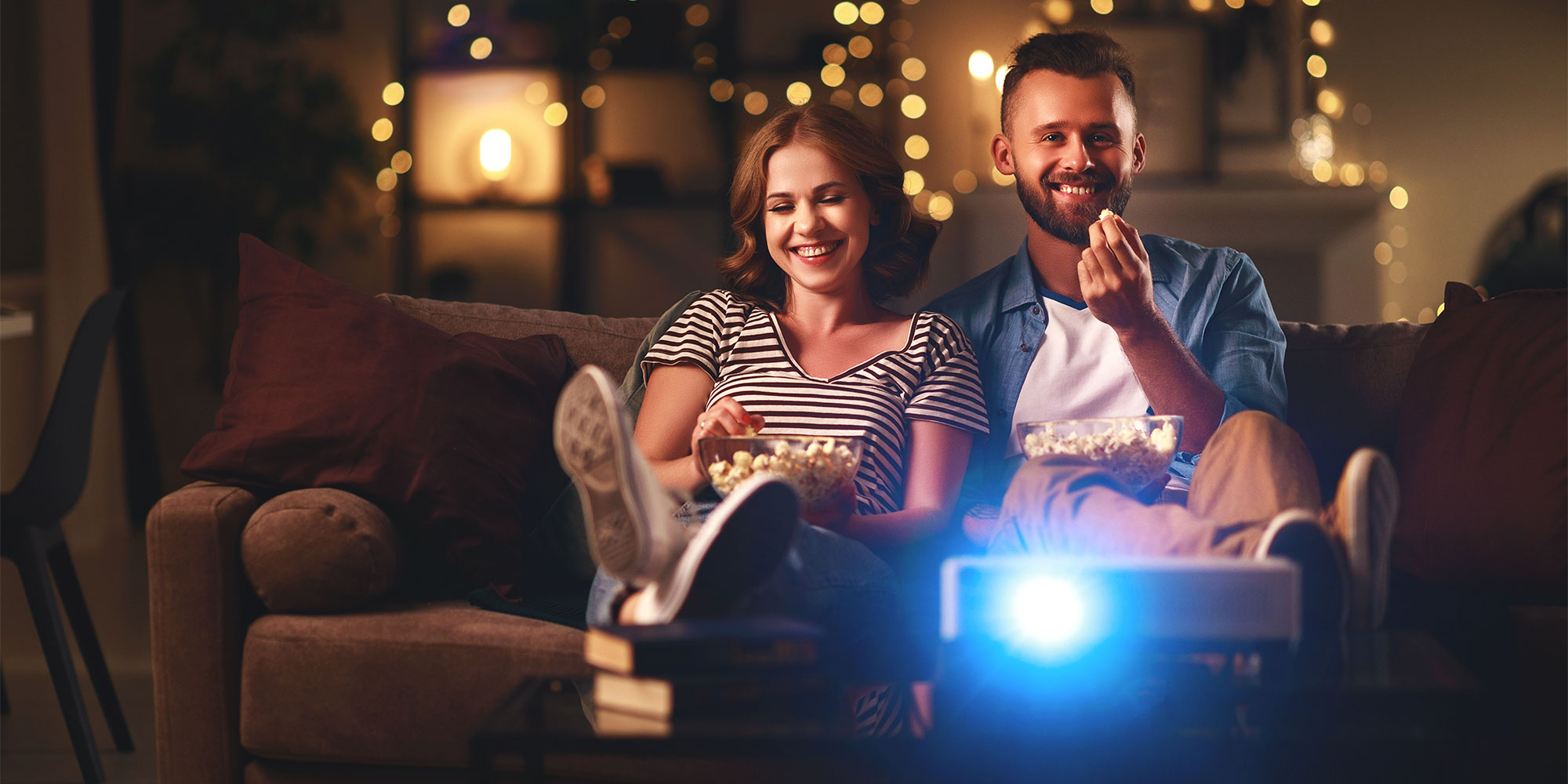 A couple using a projector