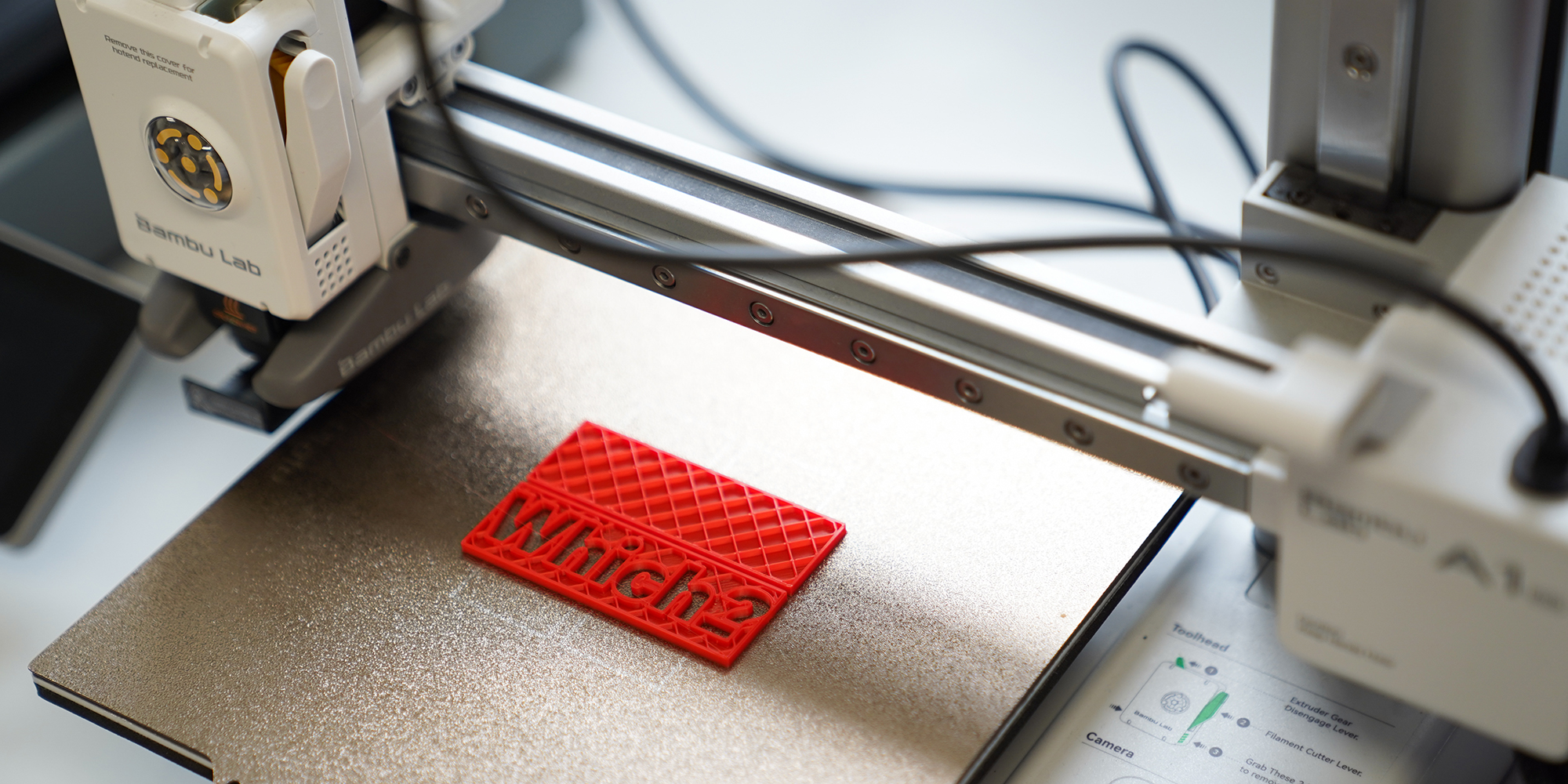 A custom Which? logo being printed