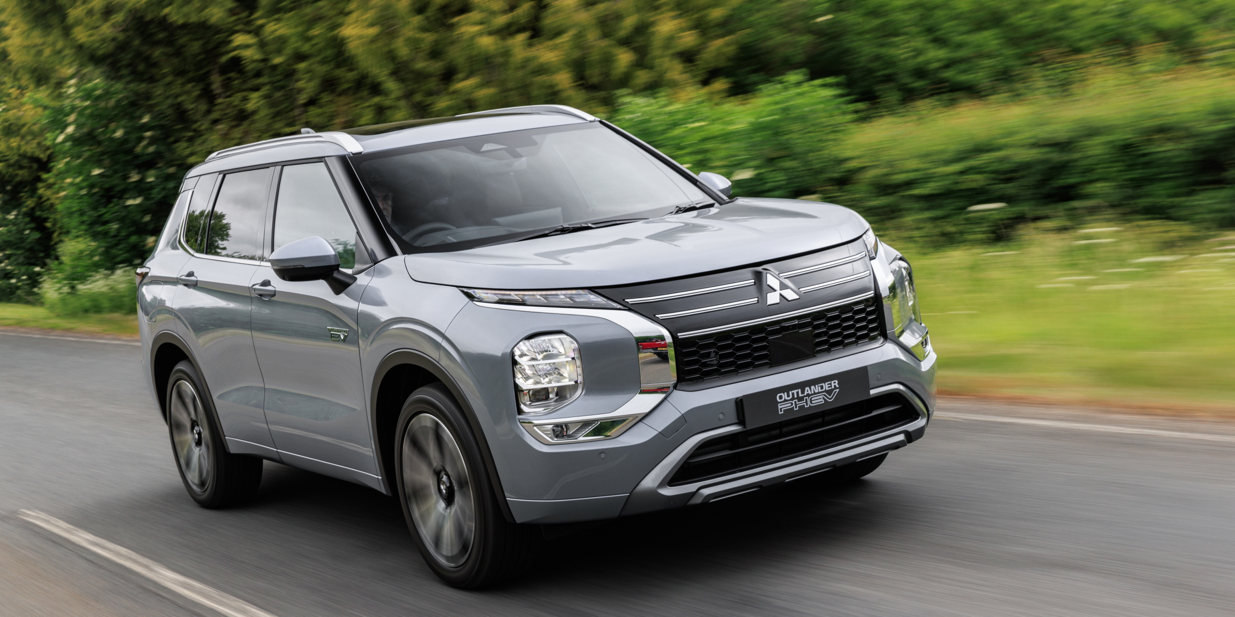 Mitsubishi Outlander on country road