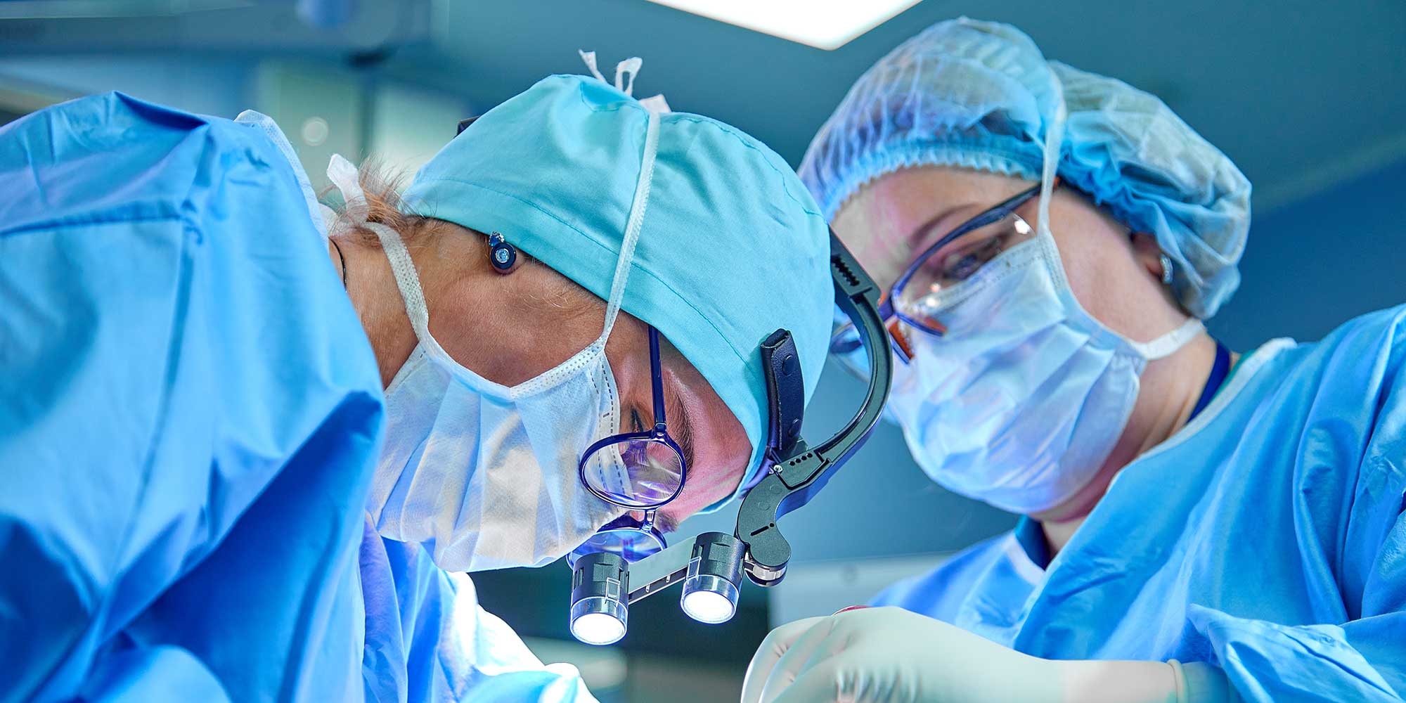 Surgeons operating