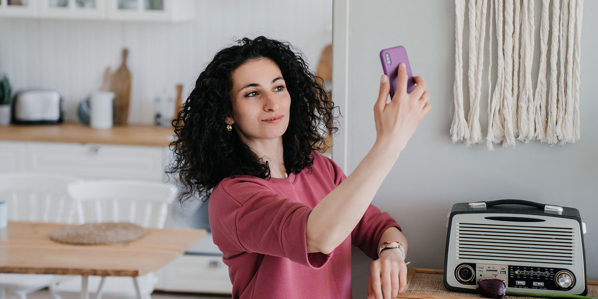 A person taking a selfie with their phone. 