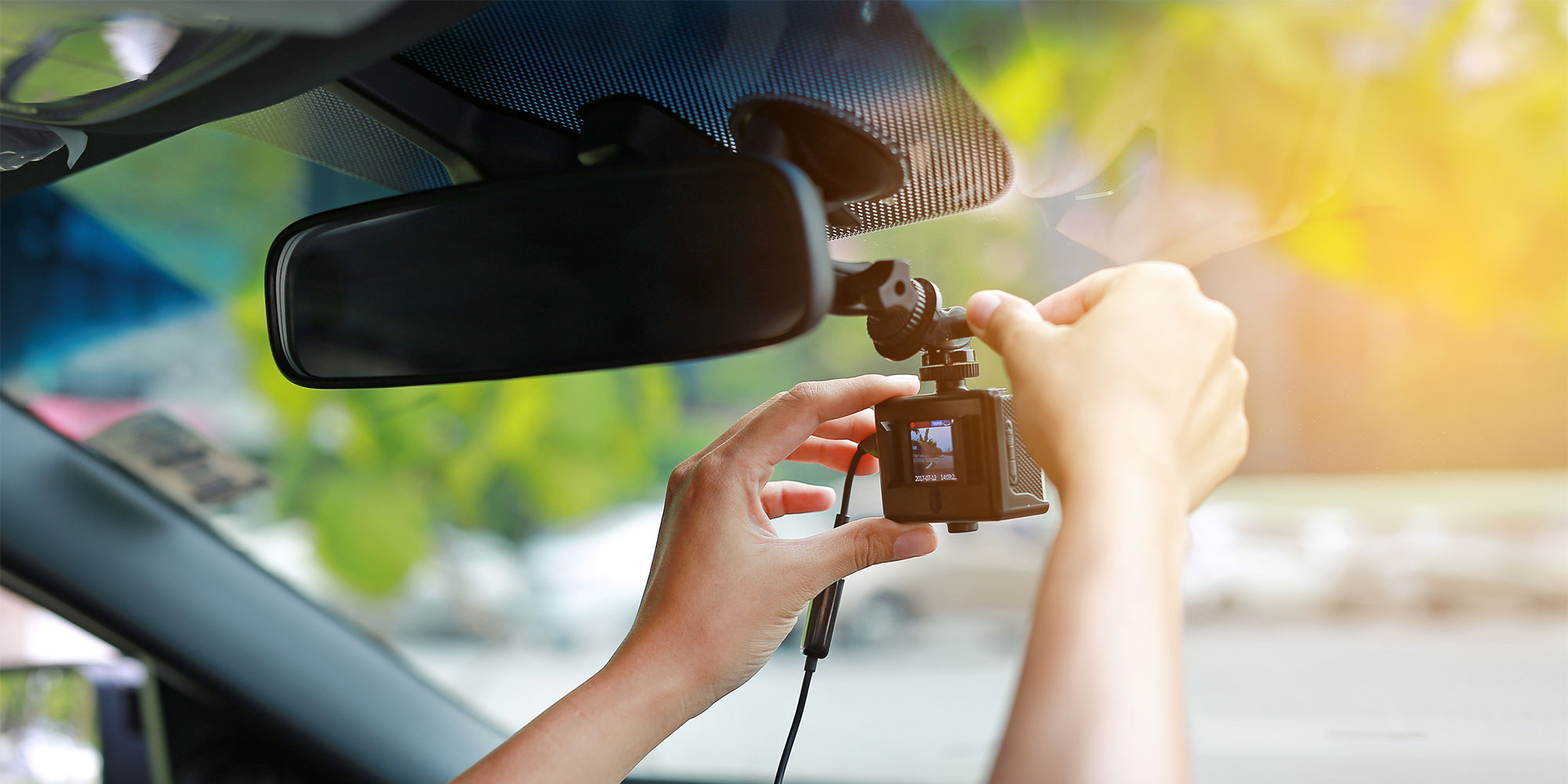 Person adjusting a das camera