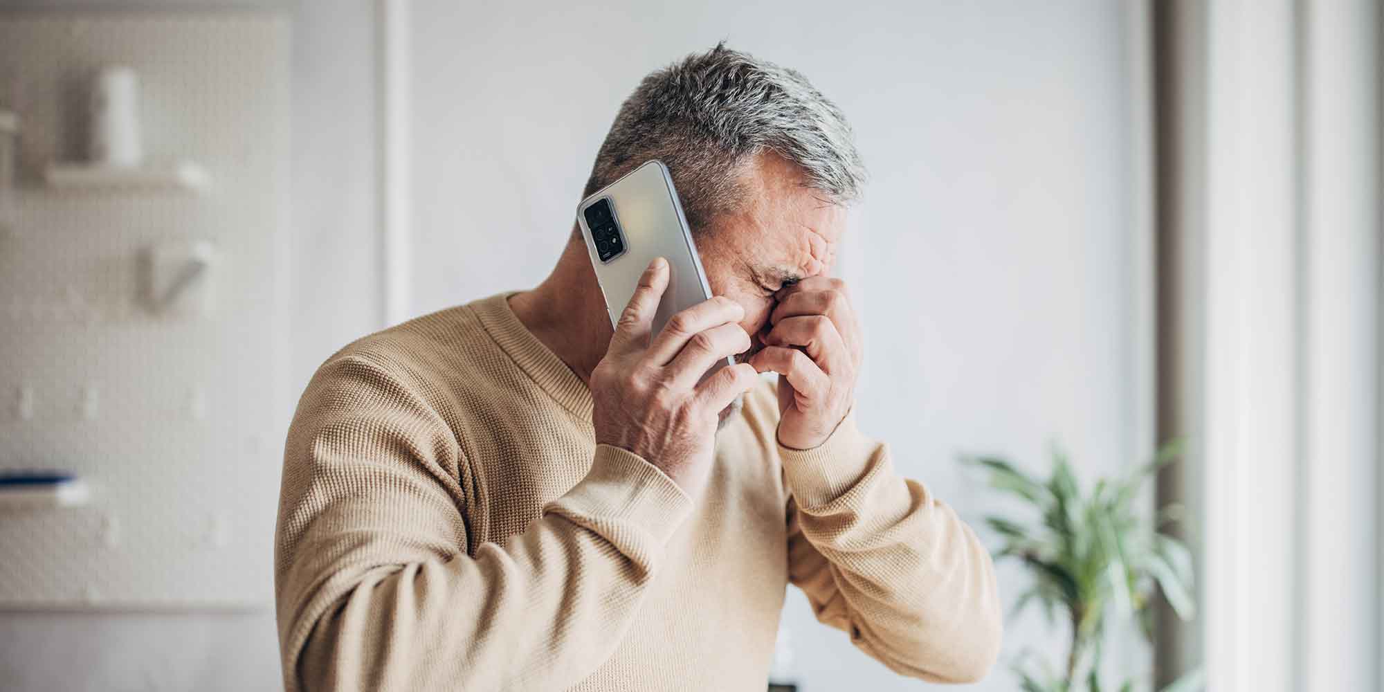 Anguished man on the phone