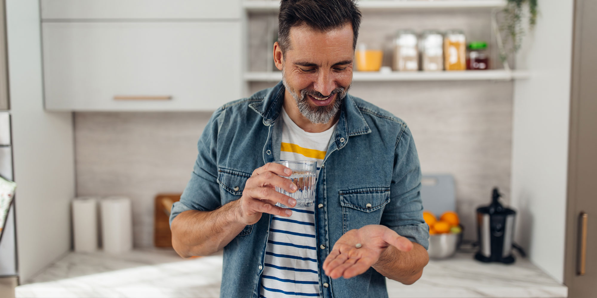 Man taking a vitamin