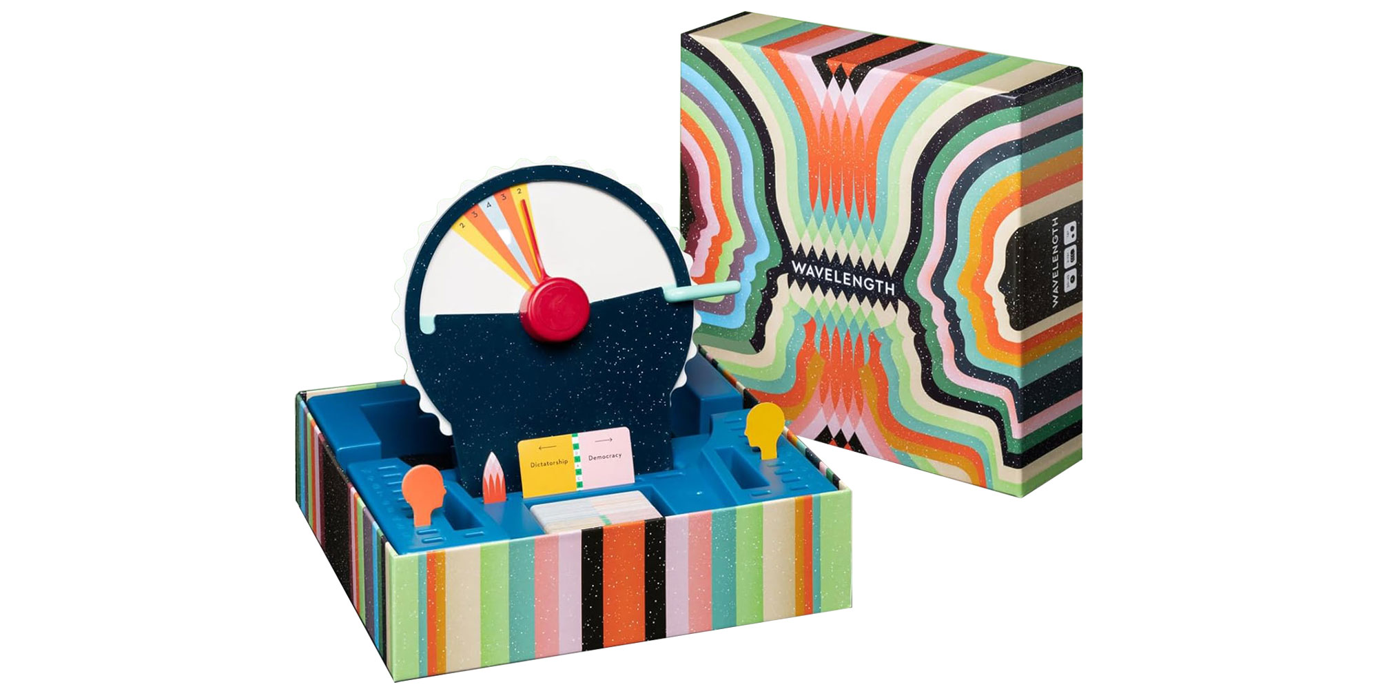 Wavelength board game displayed on table with colourful score spinner and prompt cards.