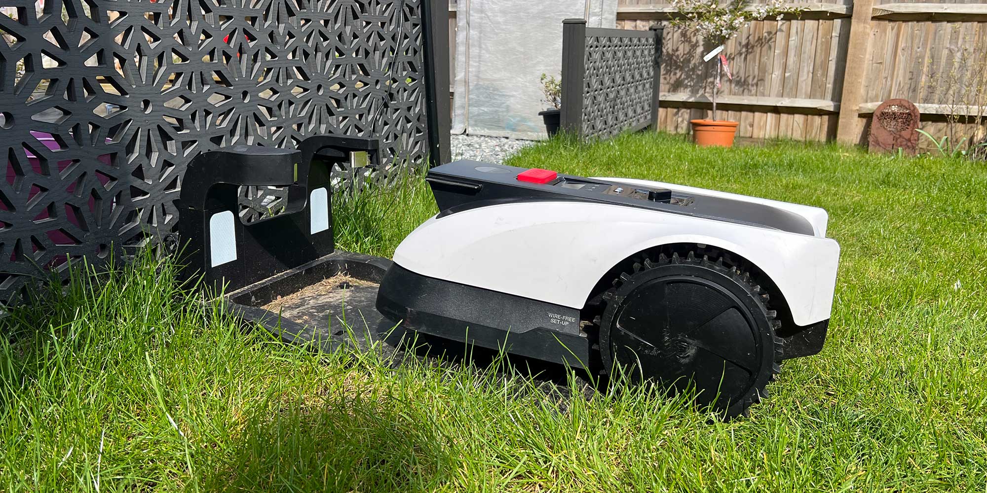 Robot lawn mower entering docking station