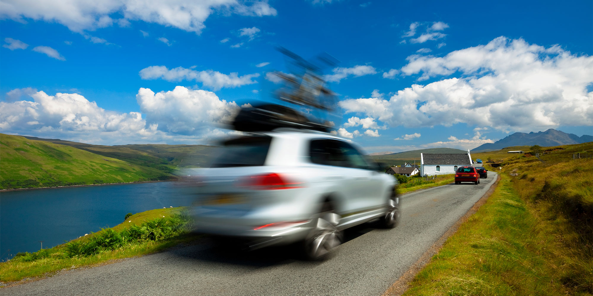 UK driving holiday - two cars on a narrow road