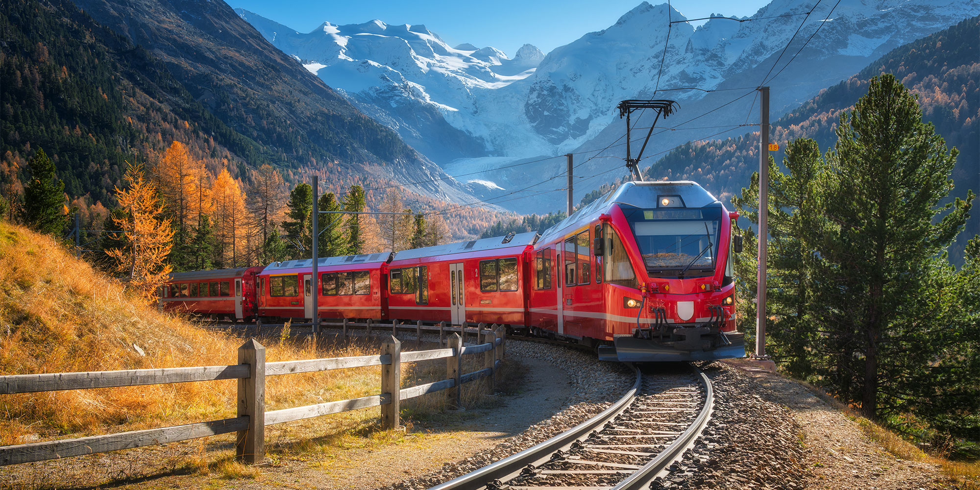 A train travelling through the Swiss Alps
