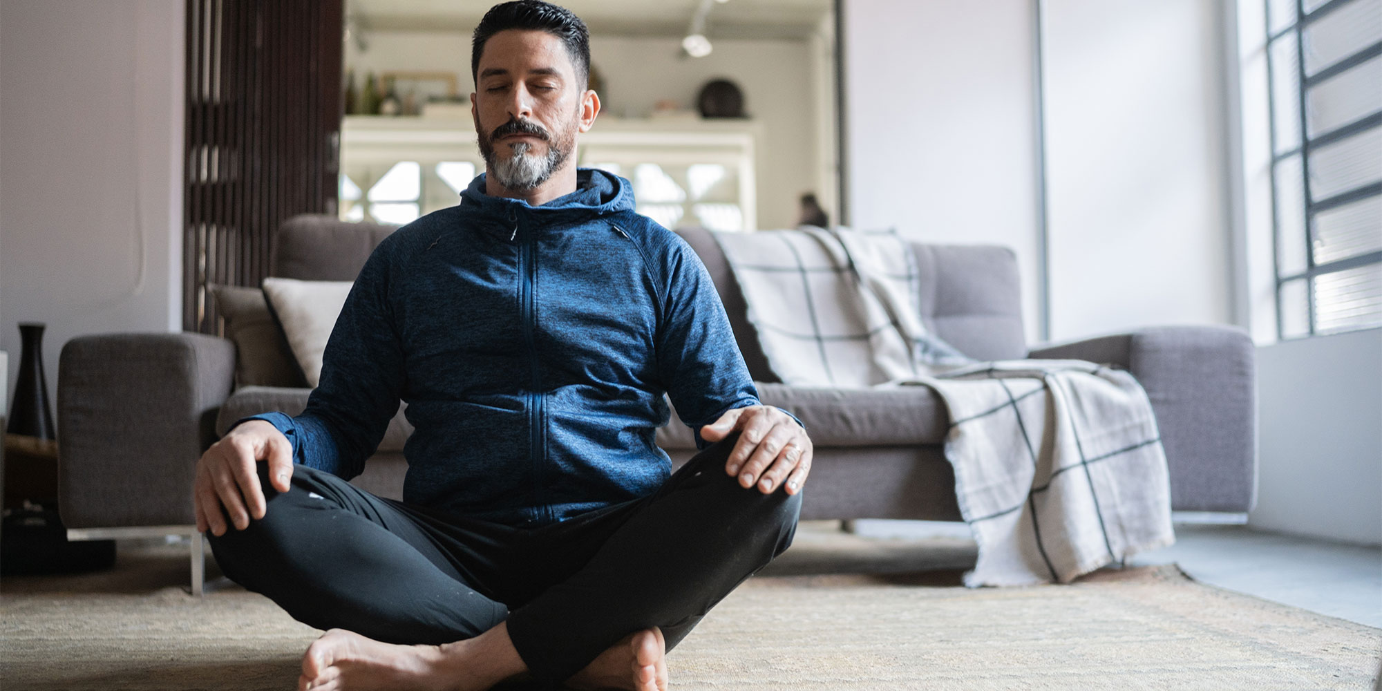 man doing yoga