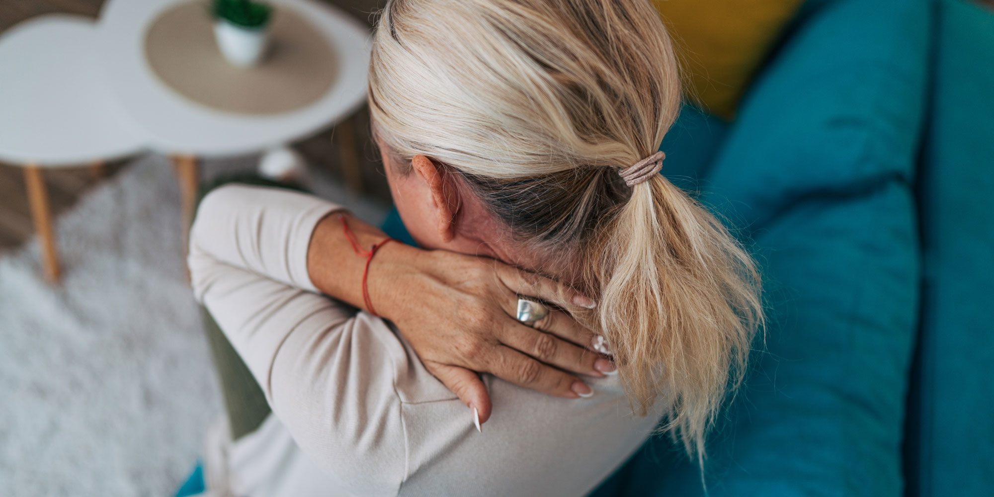 Woman with neck soreness