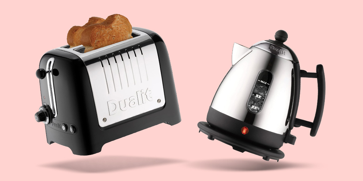 Toaster and kettle on pink background