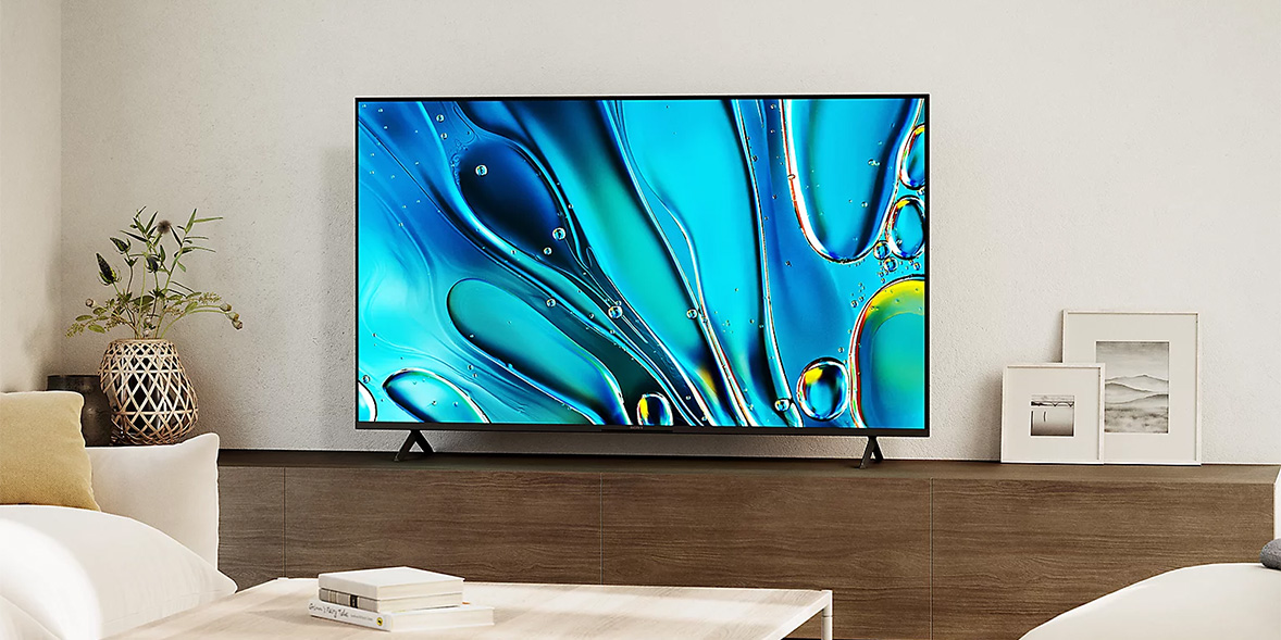 Sony K753S5BP 75-inch 4K TV on a dark wood TV stand