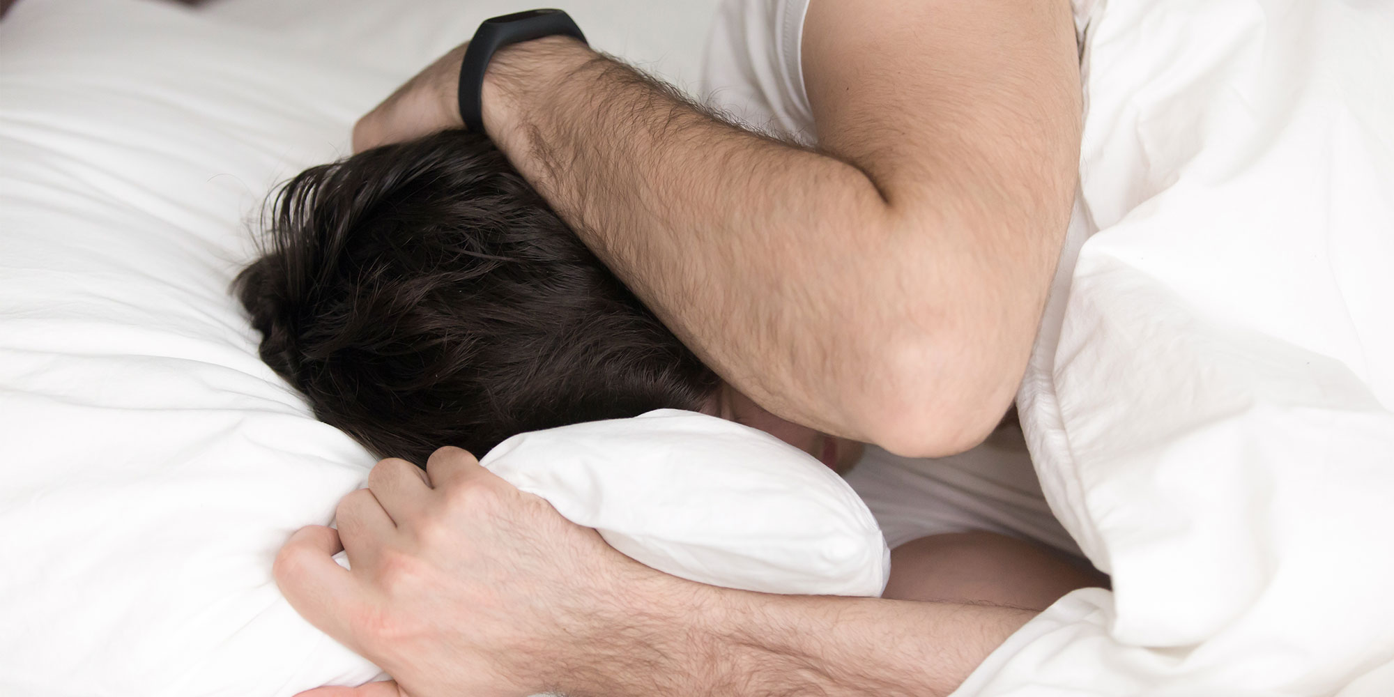 Man struggling to sleep