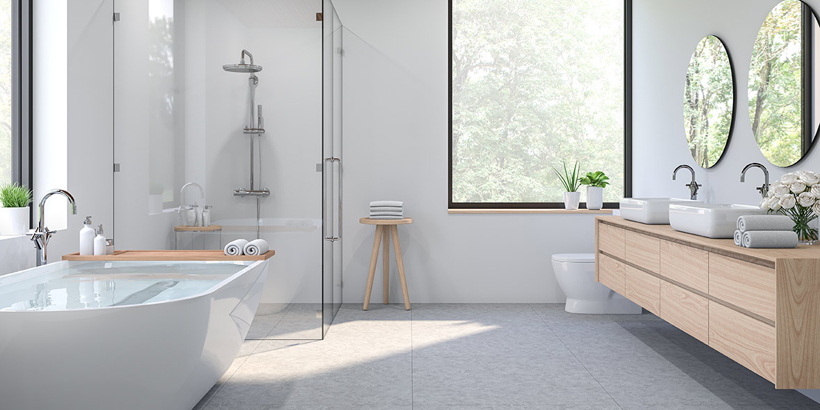 a spacious modern bathroom with bath, shower enclosure and large countertop sinks