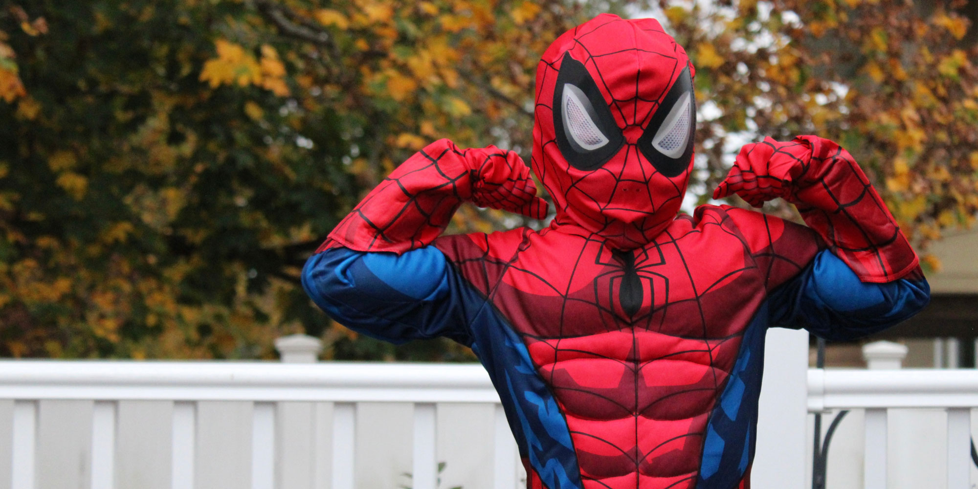 A child dressed as Spider Man