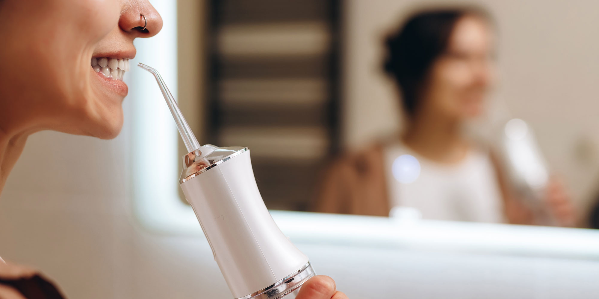 Using a water flosser