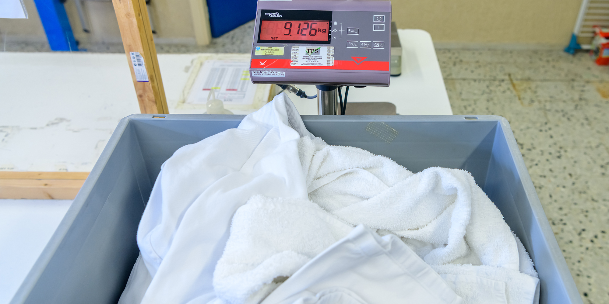 Clothes are weighed before and after drying to determine exactly how much water each machine removes.