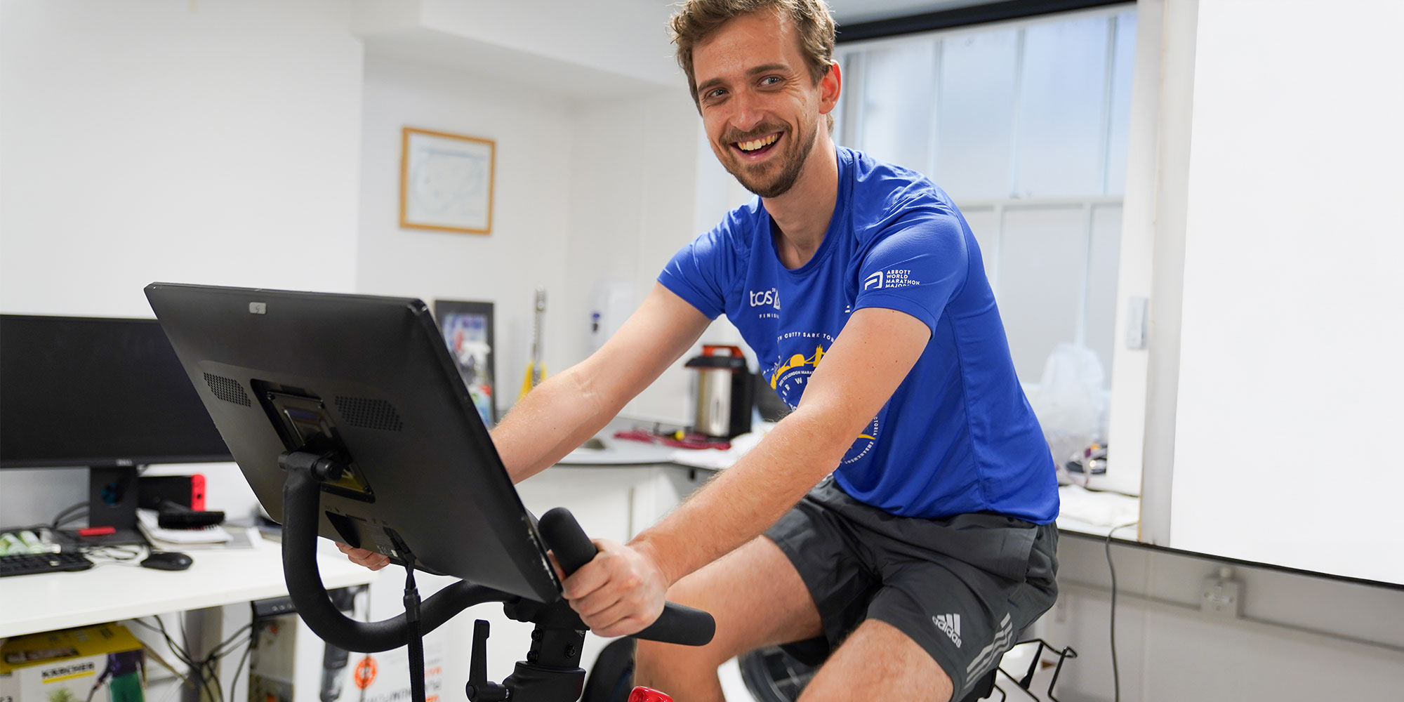 Researcher riding Peloton
