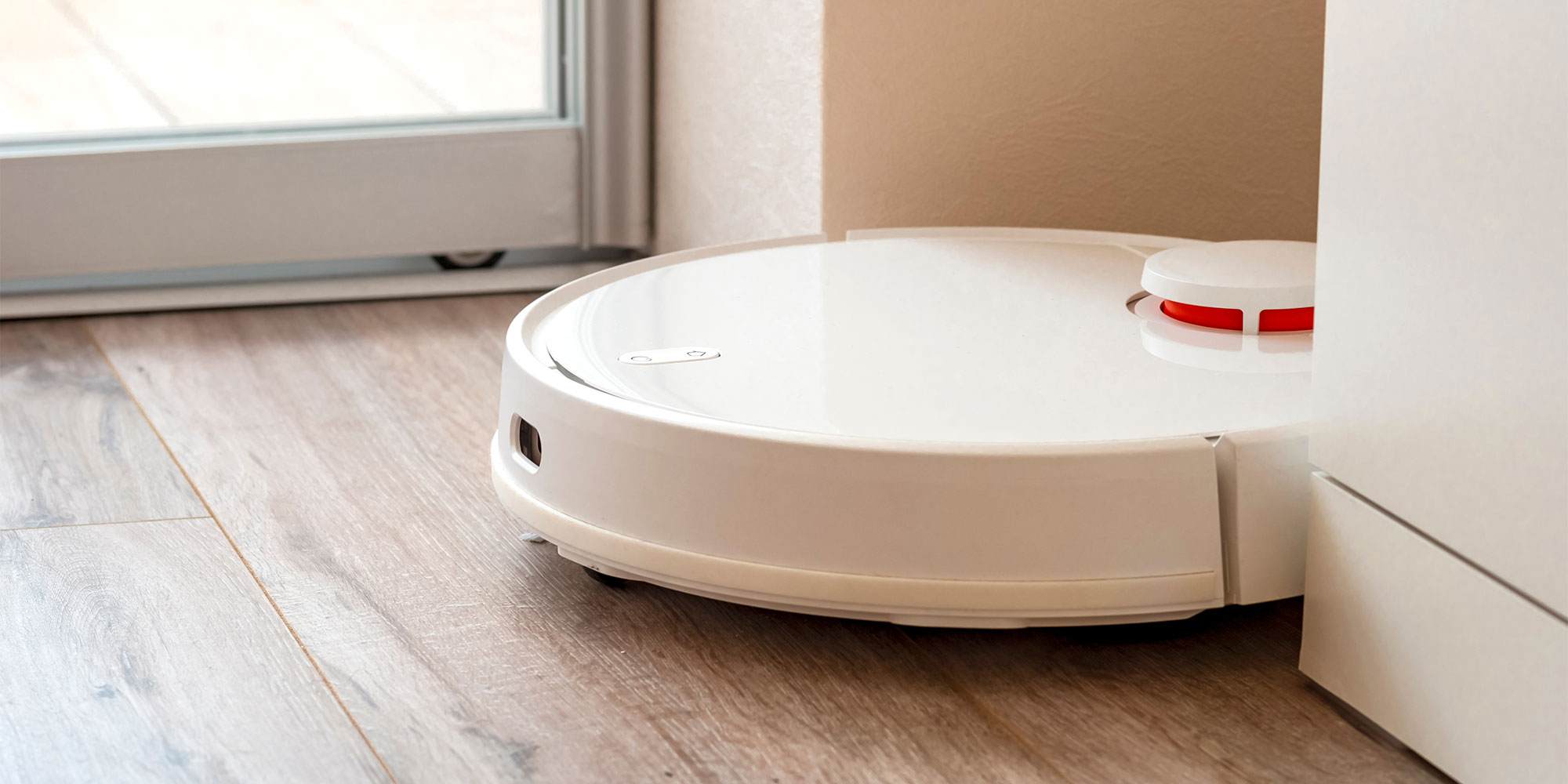 A robot vacuum stuck in a corner